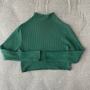 Emerald green ribbed mock neck, cropped long sleeve sweater.